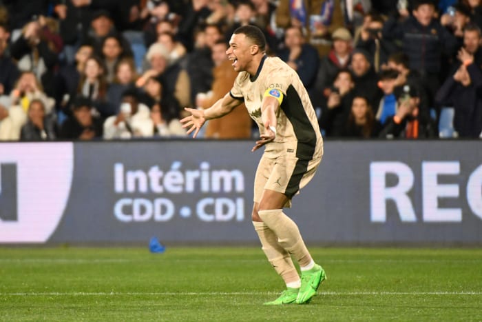 Kylian Mbappe pictured celebrating after scoring three goals for Paris Saint-Germain in a 6-2 win over Montpellier in March 2024